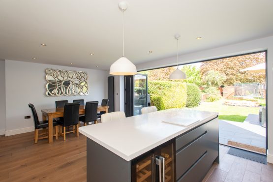 modern-kitchen-with-open-bi-fold-doors